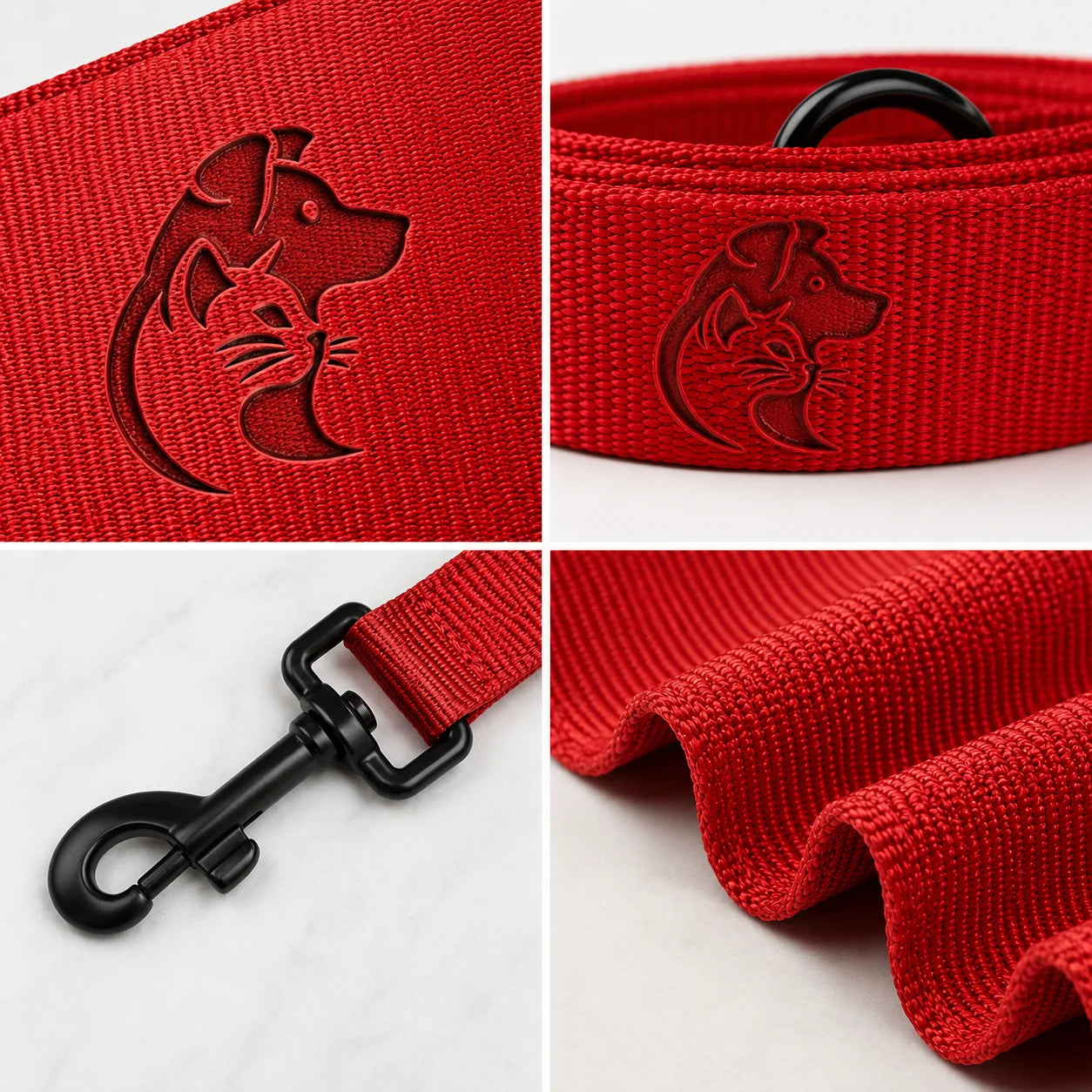 Red dog leash with black clasp and embossed dog and cat design on textured fabric