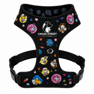 blackdogharnesswithcolorfulcartoonanimaldesignsandcrossstreetpetstoreslogo.png