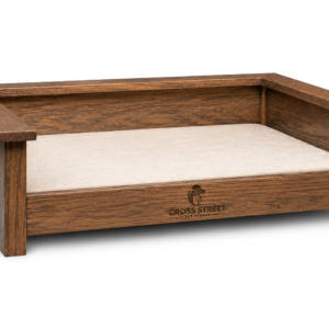 brownwoodendogbedwithwhitecushionanddrawerstorageonplainbackground f2432234 82af 498b 9146 f33ca364a82e.png